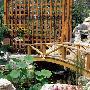 第二户亲水花园：假山鱼塘 堆砌闲适野趣庭院面积：约 装饰_居家装饰