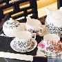 以蕾丝图案设计的茶具，大玩黑白对比色设计。蕾丝图案 家品_居家装饰