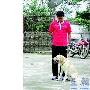 邹侑根和他的爱犬（图） 动物世界