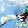 日本“圣诞老人”潜水喂白鲸（图） 动物世界