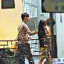 刘德华陪妻子朱丽倩拜佛 疑求子延续香火(图)