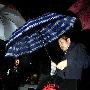 俞灏明背部伤势严重 父亲赶往探望(图)