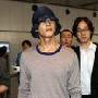 元斌抵京宣传新片 低调现身机场只露半边脸(图)