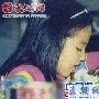 刘亦菲微博秀童年萌照 吐舌舔冰可爱童真(组图)