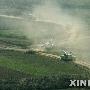 陈虎称我军四大军区跨区军演仍为战术演习(图)