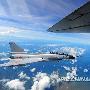 军报披露我军歼击机在南海空中加油细节(图)
