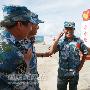 我国南沙群岛驻守岛礁全部开通手机服务吴胜利出席南沙群岛移动通信基站竣工验收仪式