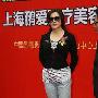 刘晓庆为某美容所站台打扮的活脱一年轻女孩