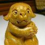 原色绿檀木雕~~福袋狗宝宝~